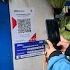 QRIS BRI: Solusi Cerdas untuk Pedagang Bunga Pasar Bratang