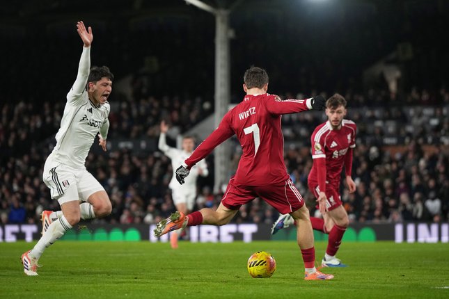 Momen Florian Wirtz mencetak gol di laga Fulham vs Liverpool, Minggu (04/01/2026). (c) AP Photo/Alastair Grant