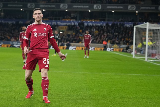 Selebrasi bek Liverpool, Andrew Robertson usai mencetak gol ke gawang Wolves di Piala FA, 7 Maret 2026. (c) AP Photo/Dave Shopland
