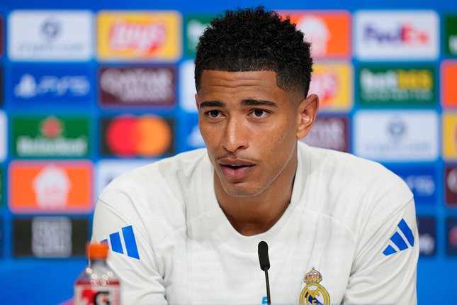 Gelandang Real Madrid, Jude Bellingham saat konferensi pers jelang leg 2 perempat final Liga Champions melawan Bayern Munchen, 14 April 2026. (c) AP Photo/Matthias Schrader