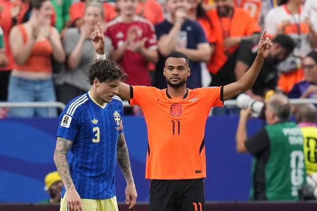 Penyerang Momen selebrasi Cody Gakpo setelah mencetak gol ketiga timnya dalam laga Piala Dunia 2026 Grup F antara Belanda vs Swedia di Houston Stadium, 21 Juni 2026 (c) AP Photo/Eric Gay