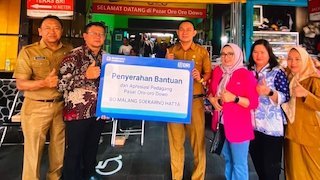 BRI Percepat Digitalisasi UMKM, Transaksi QRIS Pedagang Pasar Oro-Oro Dowo Tembus Rp2,4 Miliar BRI Percepat Digitalisasi UMKM, Transaksi QRIS Pedagang Pasar Oro-Oro Dowo Tembus Rp2,4 Miliar