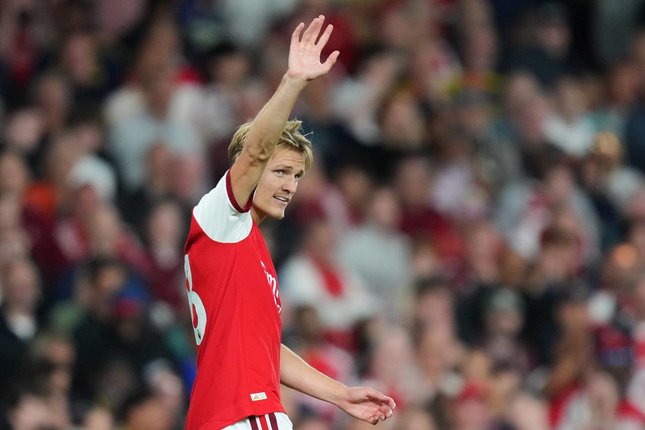 Babak Kedua Pemain Arsenal, Martin Odegaard merayakan gol ketiga dalam pertandingan Premier League melawan Coventry City, Sabtu (22/8/2026). (c) AP Photo/Kirsty Wigglesworth