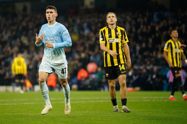Performa Foden Pemain Manchester City Phil Foden merayakan gol dalam pertandingan Liga Champions melawan AEK Athena, Rabu (21/10/2026). (c) AP Photo/Dave Thompson