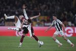 Roma dan Juventus Berbagi Poin di Olimpico