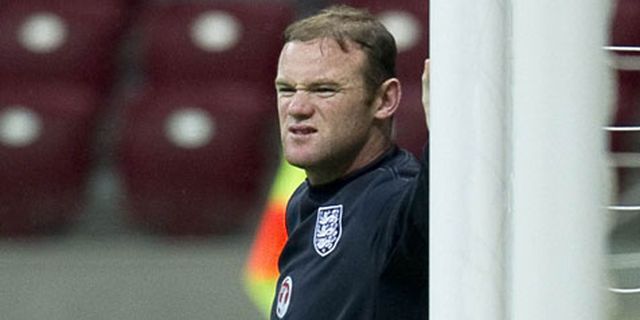 Rooney Janjikan Kompensasi Untuk Fans Inggris