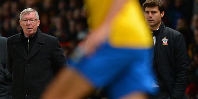 United Berburu Suksesor Vidic dan Ferdinand