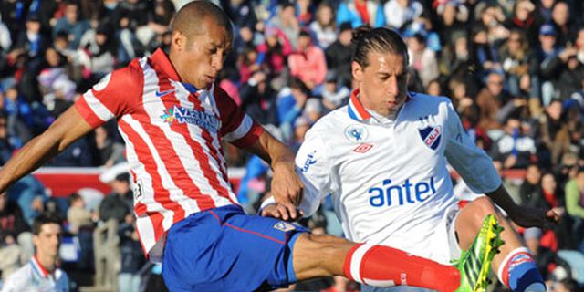 Dua Gol Baptistao Menangkan Atletico