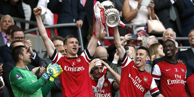 Mertesacker: Piala FA Bisa Jadi Motivasi Arsenal