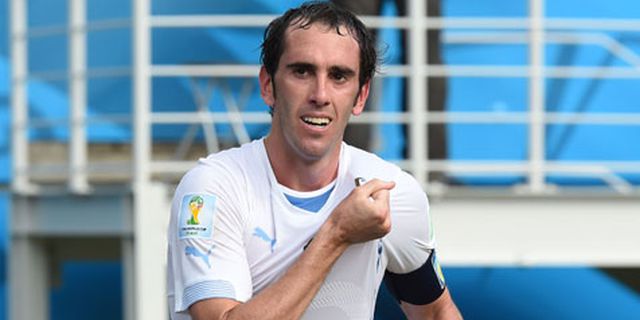 Godin Tegaskan Bertahan di Atletico Godin Tegaskan Bertahan di Atletico