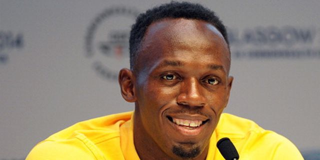 Manusia Tercepat Dunia Masih Bernafsu Bela United Manusia Tercepat Dunia Masih Bernafsu Bela United