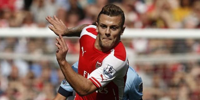 Enggan Rugi, Gooners Ini Ubah Jersey RVP Jadi Wilshere dengan Spidol