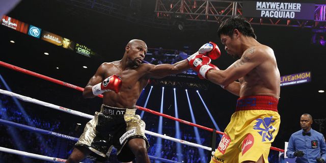 Atasi Pacquiao, Mayweather Pertahankan Rekor Unbeaten