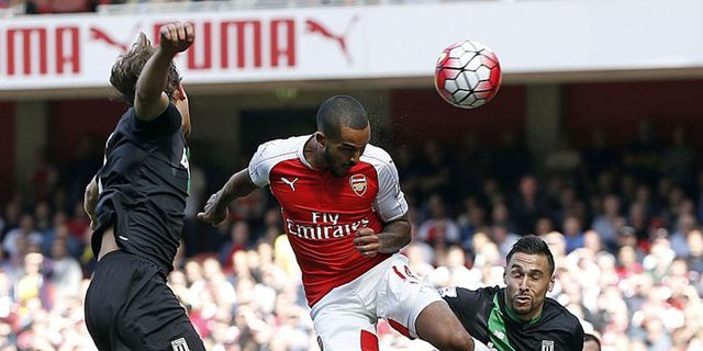 Wenger: Walcott Cetak Gol Layaknya Seorang Striker