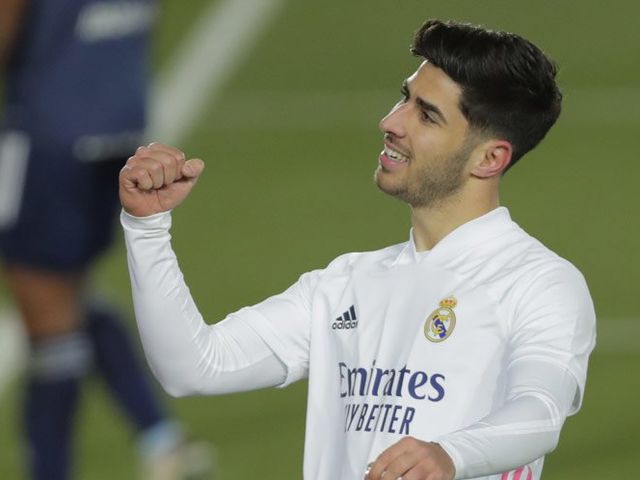 Marco Asensio usai mencetak gol ke gawang Celta Vigo pada pekan ke-17 La Liga musim 2020/2021 (c) AP Photo