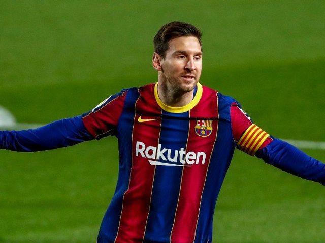 Selebrasi bintang Barcelona, Lionel Messi usai membobol gawang Getafe, Jumat (23/4/2021) (c) AP Photo