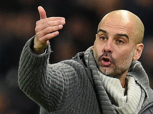 Josep Guardiola (c) AFP