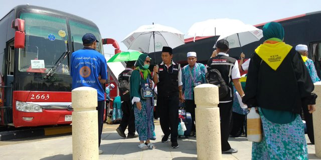 Ojek Payung di Tanah Suci