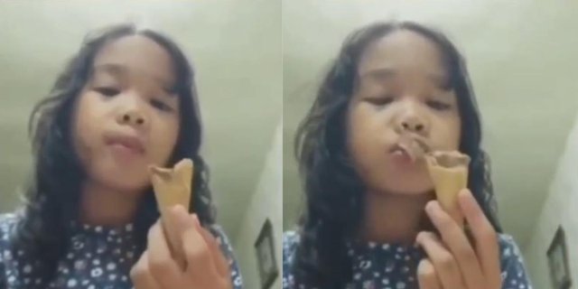 Surprised and disgusted, Little Girl Finds Lizard in Her Last Bite of Ice Cream
