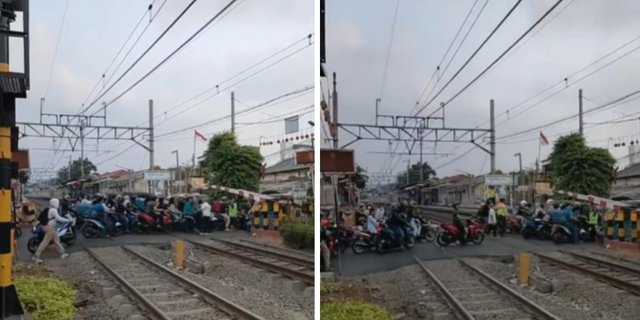 Indonesian Citizens +62, Motorcyclists Stubbornly Cross the Railway Crossing Gate and Instead the Train Gives In