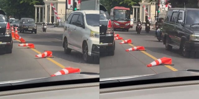 Due to the Extreme Heat in Semarang City, Traffic Cones on the Road are Melting