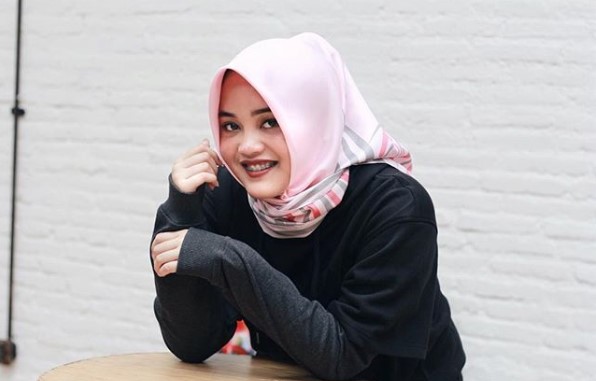 Putri Delina