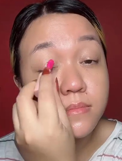 Applying Tinted Lip Balm