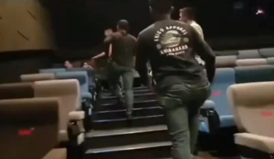 Viral video of the moment motorcycle theft suspect is caught while enjoying a movie in the cinema.