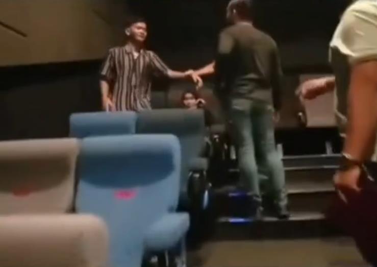 Viral video of the moment motorcycle theft suspect is caught while enjoying a movie in the cinema.