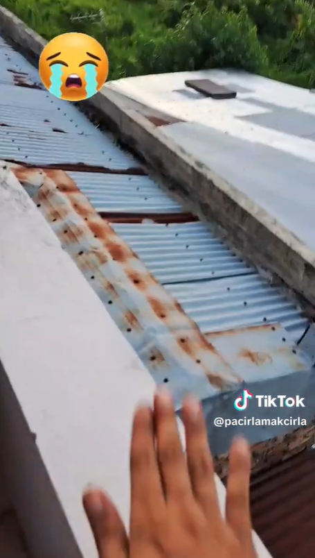 This man's mattress disappeared and flew onto his neighbor's roof