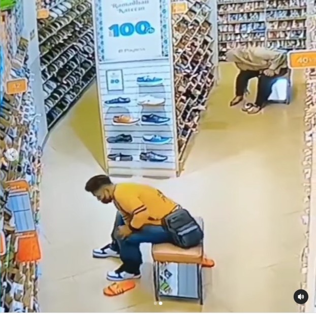 CCTV Footage: Man Exchanges Worn-out Sandals with New Shoes in Viral Mall on Social Media