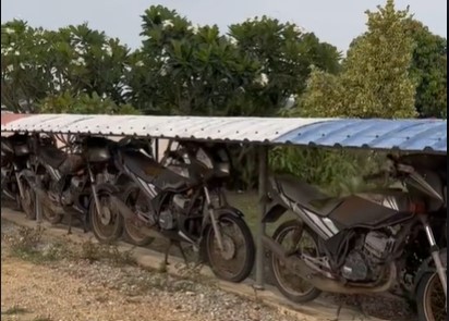 Motorcycle fence house