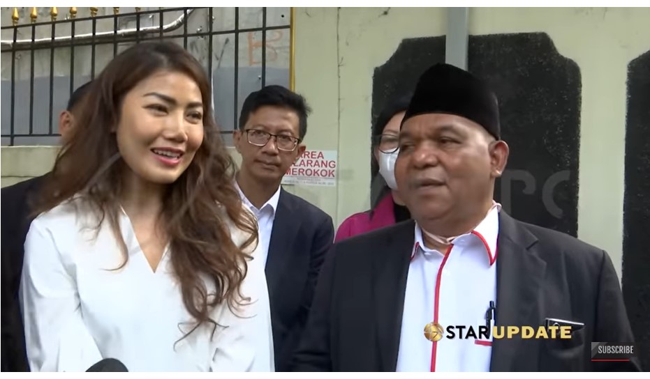 Inge Anugrah and her lawyer