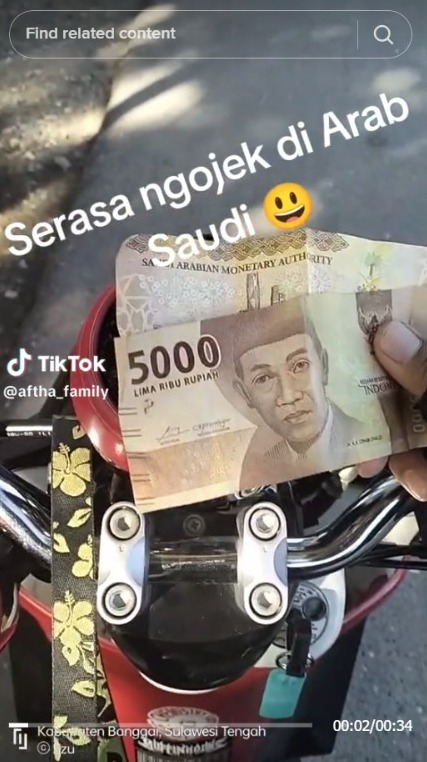 Passenger Mistakenly Pays with Riyal, Motorcycle Taxi Driver Feels Like He's in Saudi Arabia