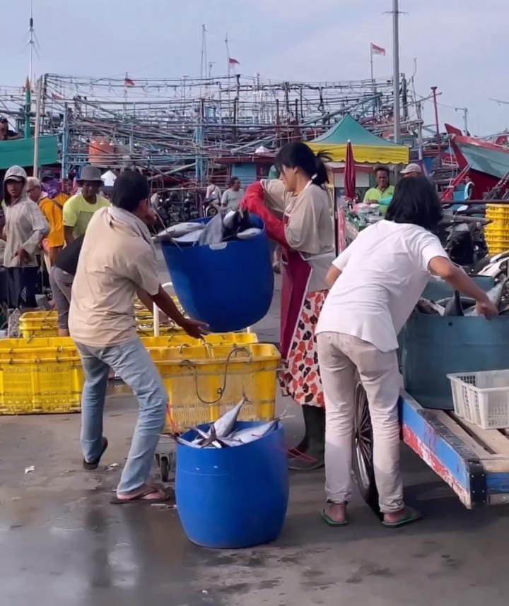 Portrait of Titi Kamal as a Fish Seller