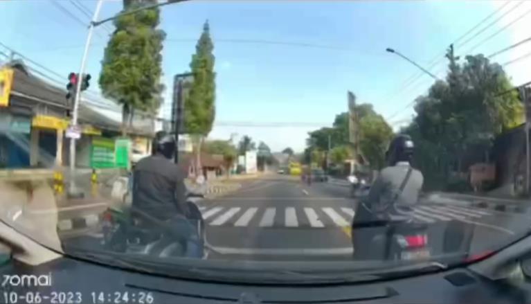 Moments of Reckless Truck Driver at Traffic Light.