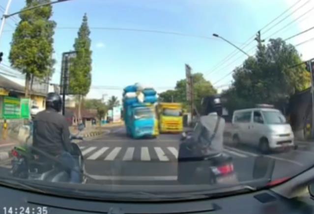 Moments of Reckless Truck Driver at Traffic Light.