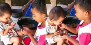 Video Kakak Adik Makan Sepotong Roti Ini Bikin Haru Warganet