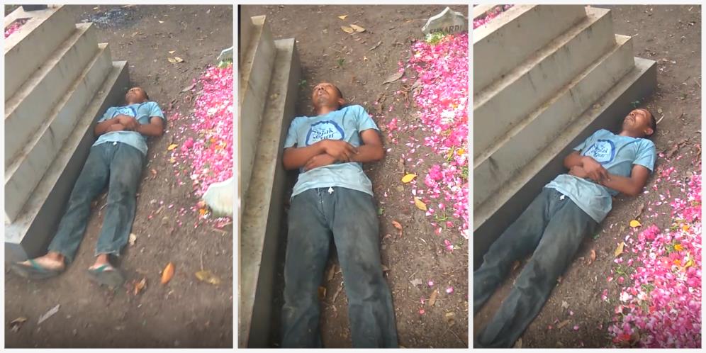 Viral Video Pria Tidur Tanpa Alas di Sebelah Makam, Aksinya Bikin Penasaran