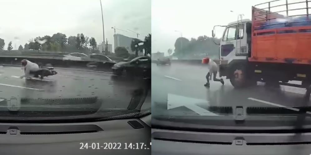 Video Detik-Detik Pemotor Lolos dari Maut Usai Tergelincir Akibat Jalan Licin, Nyaris Dilindas Truk