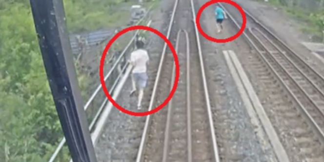 Video Detik-Detik Menegangkan Dua Anak Hampir Tertabrak Kereta Api Saat Lomba Lari