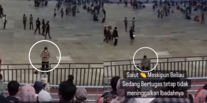 Masya Allah, Pak Polisi Ini Tetap Sholat Meski Sedang Jaga Konser Musik, Bersujud di Tengah Keriuhan Stadion
