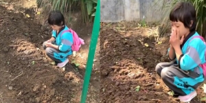Tampak Khusyuk Berdoa di Samping Gundukan Tanah Masih Merah, Aksi Bocah Ini Malah Bikin Ngakak Netizen