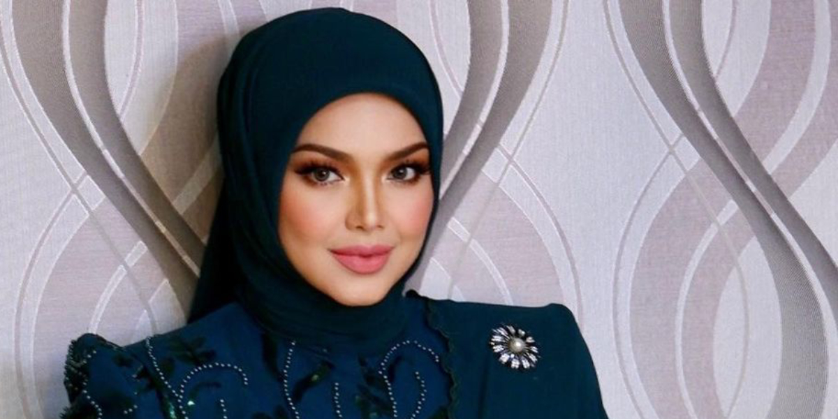 Viral Video Siti Nurhaliza Gunakan Tas Dior Buat Penyangga Handphone