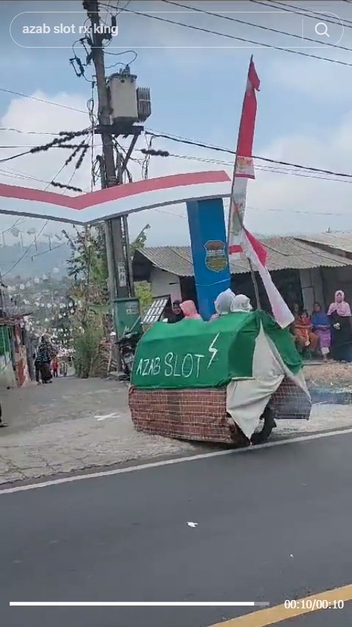 Appearance of Racing Coffin in August 17 Parade, Writing on the Shroud Distracts Focus