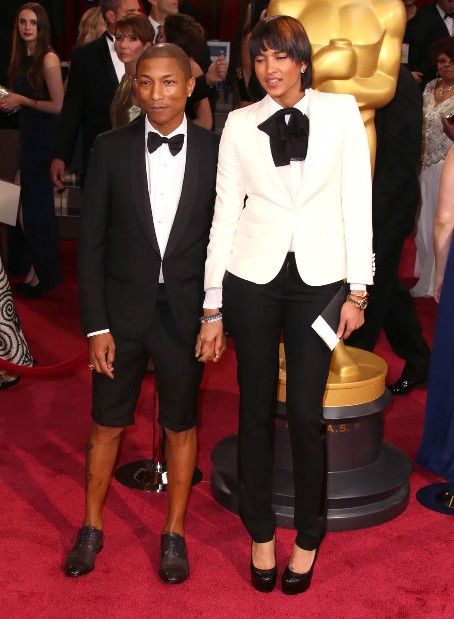 Pharrell Williams dan istrinya @ fameflynet.com