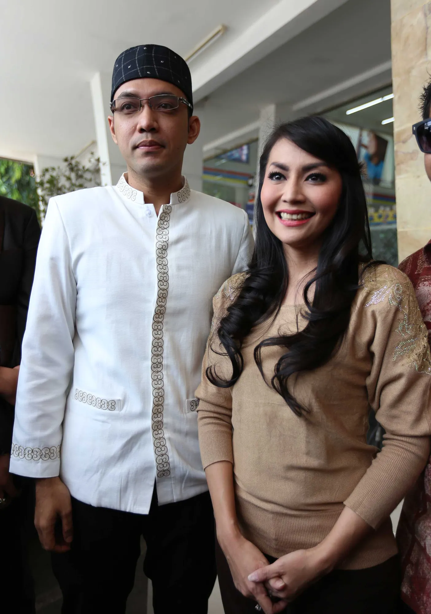 Senyum terakhir Sandy & Tessa pasca resmi cerai / KapanLagi® - Foto: Budy Santoso