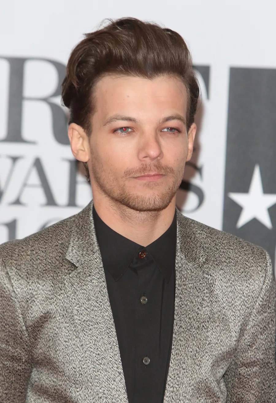 Louis Tomlinson dikatakan telah kembali ke studio untuk merekam materi barunya © TPG Images