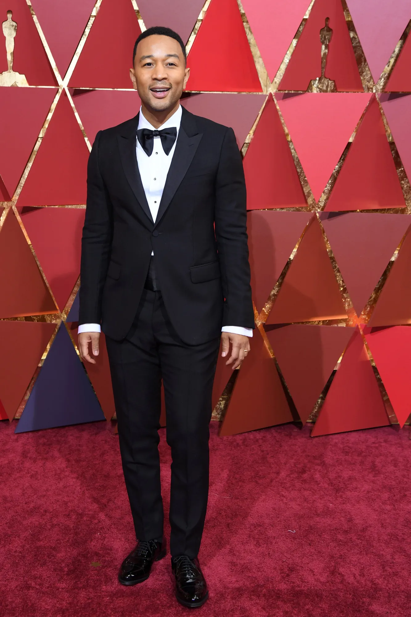 John Legend hadir dengan gaya gentlemen look. ©AFP
