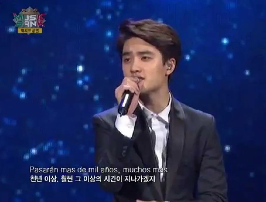 D.O. saat nyanyi lagu Spanyol © KBS2